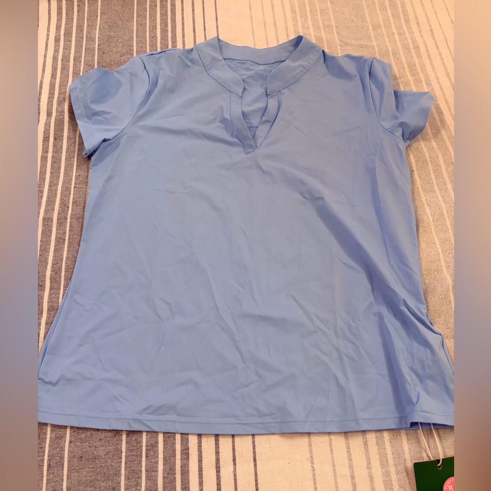 HALARA Light Blue Short Sleeve Polo Tee
Size XS